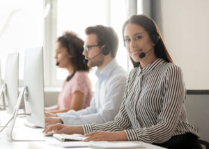 Call Center Workers Wearing Headset Use Pc Focused Help Client Make Telemarketing Calls Concept